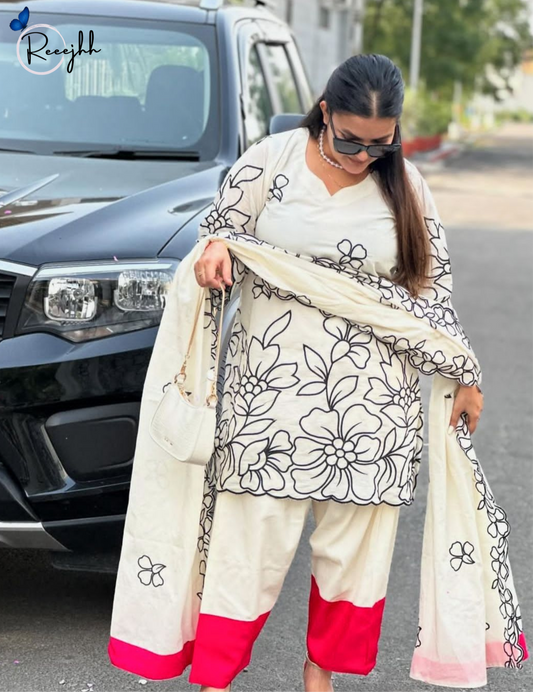 Elegant in white & black florals with a pop of pink – timeless Punjabi charm